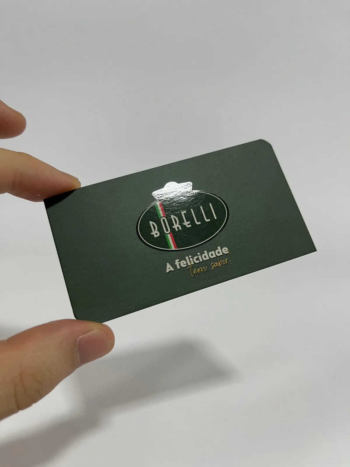 Cartão de visita com verniz localizado, detalhe